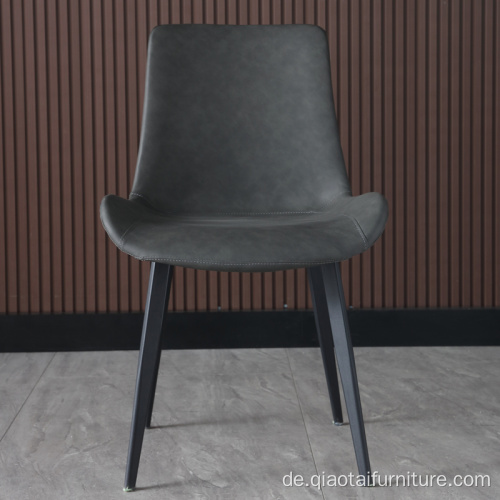 Wohnmöbel Graue Stühle aus Kunstleder